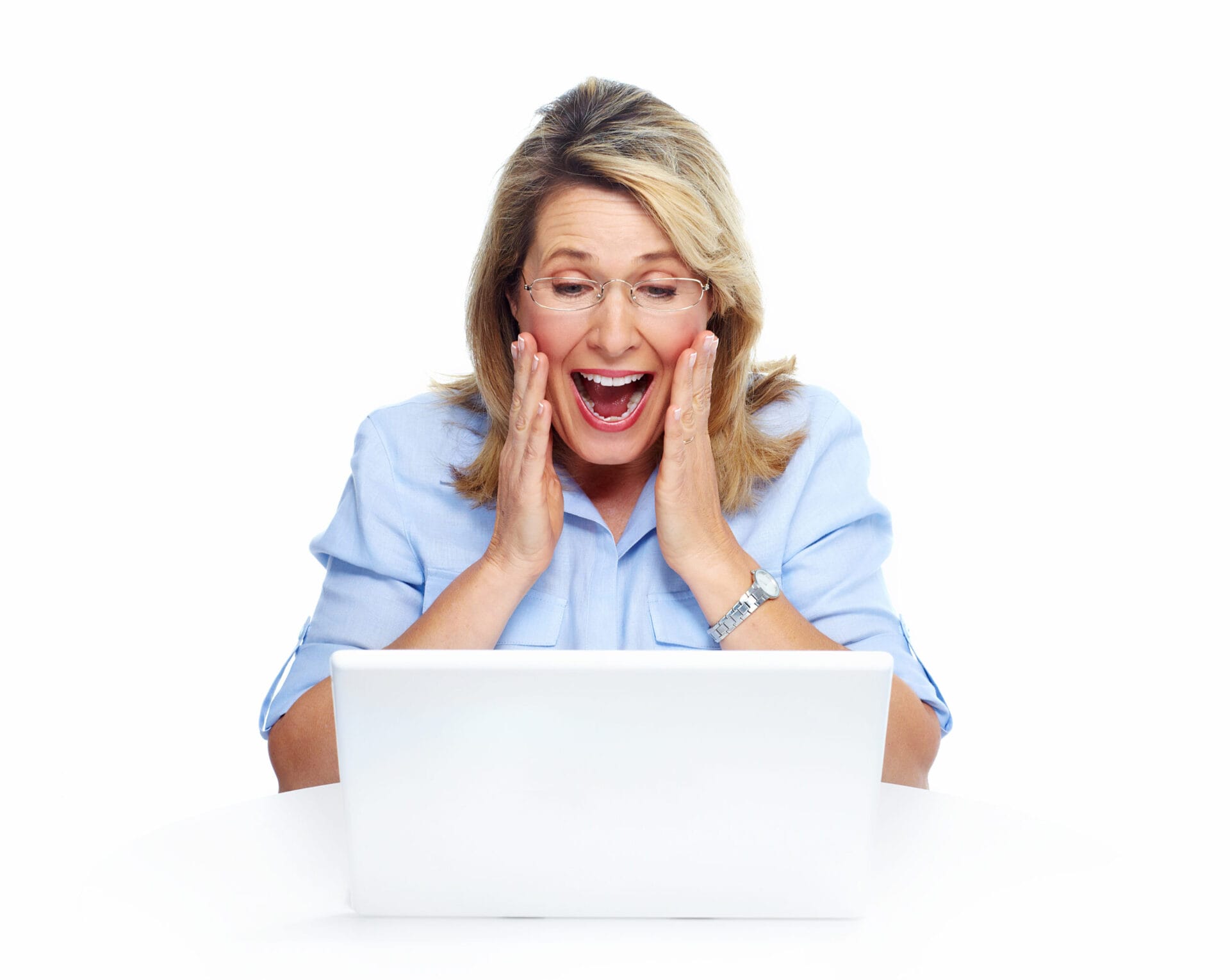 Happy senior woman with laptop computer. Isolated over white bac